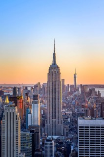 View of Midtown and Downtown Manhattan and Empire State Building from Top of the Rock Observation Center at sunset