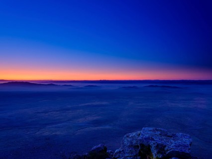 View from a summit to Mongolian steppe at blue hour