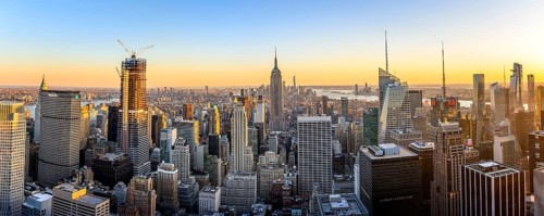 View of Midtown and Downtown Manhattan and Empire State Building from Top of the Rock Observation Center at sunset