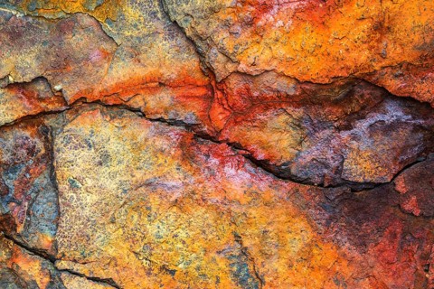 Colourful rust on a ferrous rock