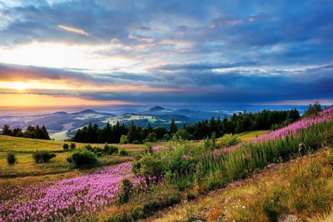 View from the Wasserkuppe to the hilly landscape at sunset