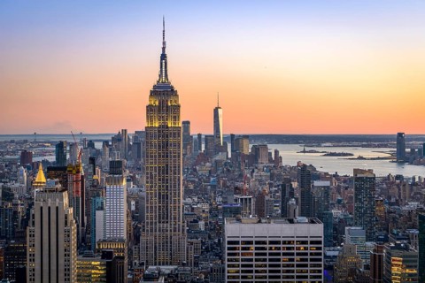 View of Midtown and Downtown Manhattan and Empire State Building from Top of the Rock Observation Center at sunset
