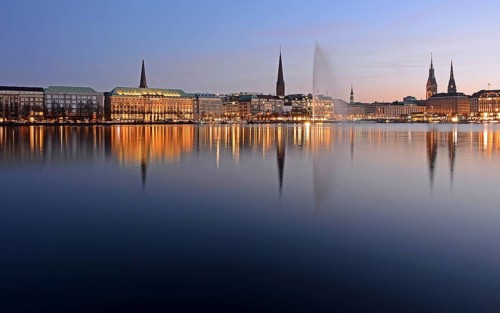 Inner Alster Lake with Alster fountain at dusk