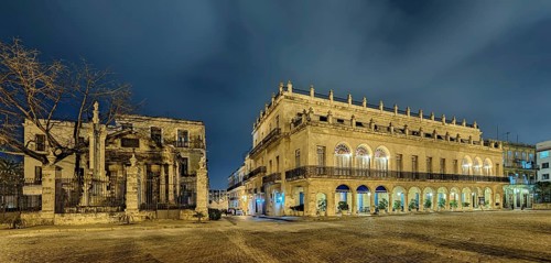Plaza de Armas with Hotel Santa Isabel at night