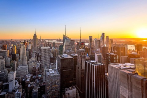 View of Midtown and Downtown Manhattan and Empire State Building from Top of the Rock Observation Center at sunset