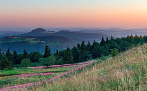 View from the top of the Wasserkuppe to the hilly landscape