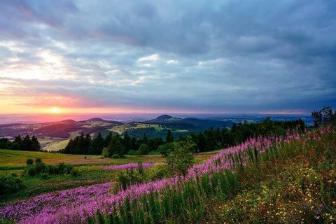 View from the Wasserkuppe to the hilly landscape at sunset