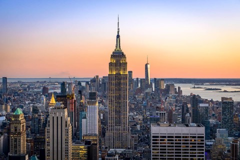 View of Midtown and Downtown Manhattan and Empire State Building from Top of the Rock Observation Center at sunset