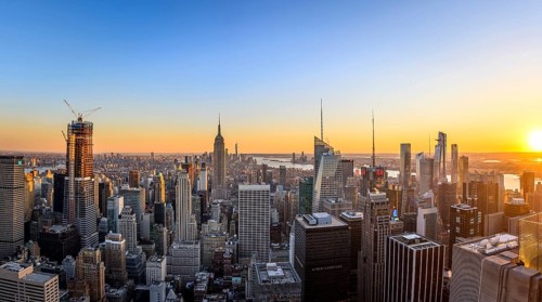 View of Midtown and Downtown Manhattan and Empire State Building from Top of the Rock Observation Center at sunset
