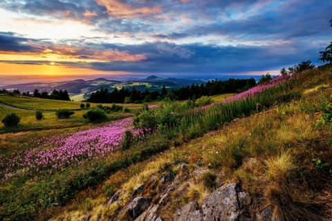 View from the Wasserkuppe to the hilly landscape at sunset