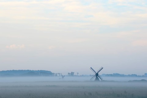 Small windmill with ground fog