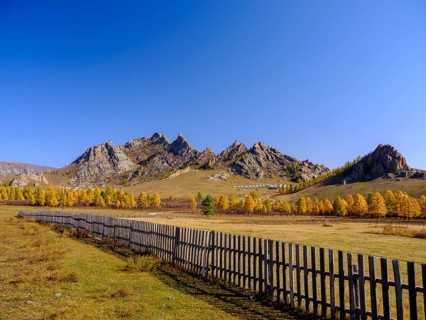 Autumnal colored trees and rocks in Gorky Terelj National Park
