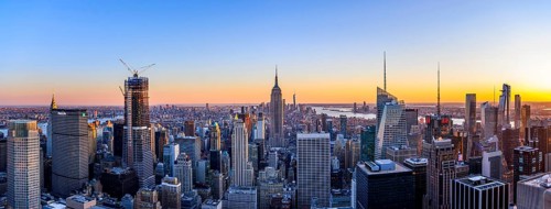 View of Midtown and Downtown Manhattan and Empire State Building from Top of the Rock Observation Center at sunset