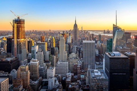 View of Midtown and Downtown Manhattan and Empire State Building from Top of the Rock Observation Center at sunset
