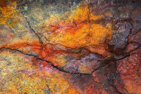 Colourful rust on a ferrous rock