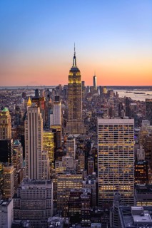 View of Midtown and Downtown Manhattan and Empire State Building from Top of the Rock Observation Center at sunset
