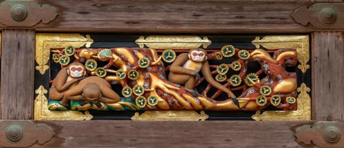 Carving of the three monkeys on the facade of the holy stable