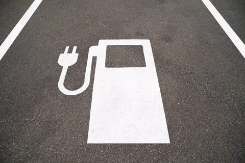 Symbol of an electric filling station on a parking lot