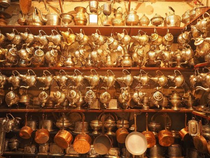 Shop with traditional silver and brass crockery