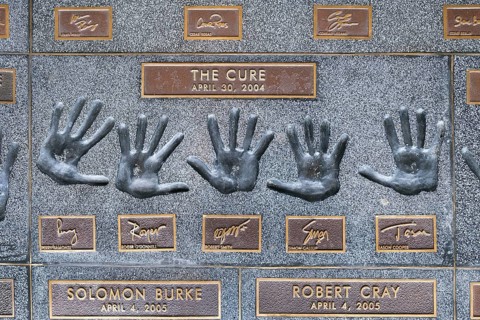 Hands of the band The Cure with Perry BamonteRoger O'Donnell