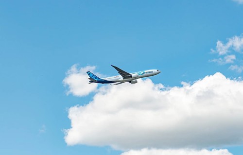 Passenger aircraft Airbus A330neo in flight