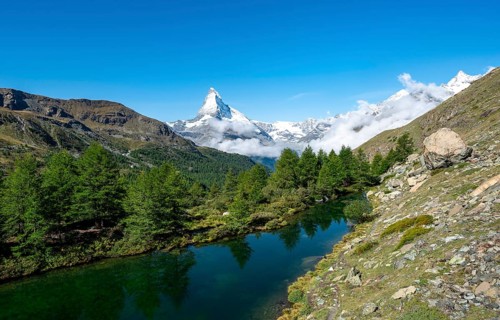 View over Lake Grindij with snow-covered Matterhorn