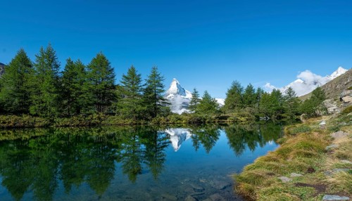 Snow-covered Matterhorn reflected in the lake