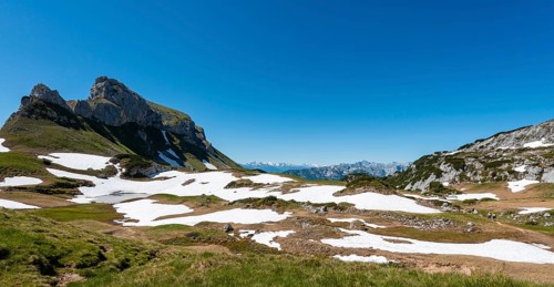 Mountain landscape with snow remains