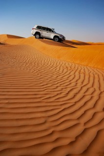 Off-road vehicle in the sand dunes