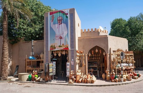 Clay jugs in front of souvenir shop