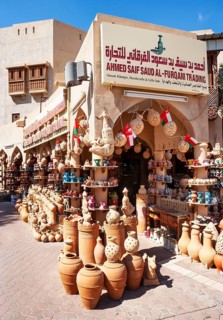 Clay jugs in front of souvenir shop