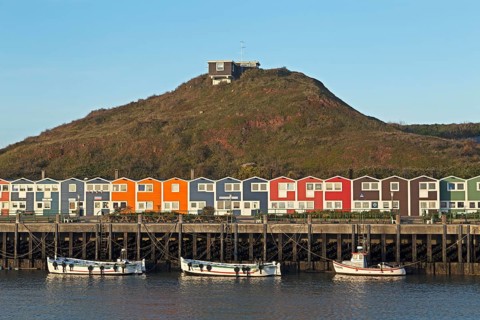 Lobster shacks with fishing boats