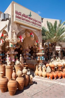 Clay jugs in front of souvenir shop