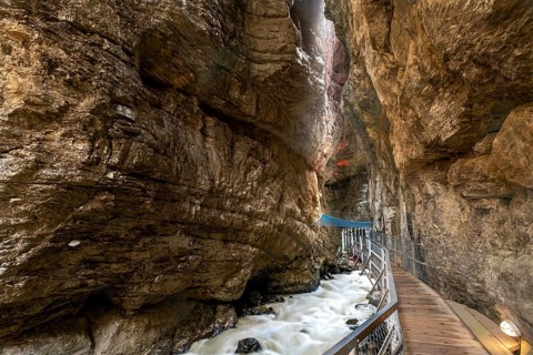River Weisse Luetschine flows through Grindelwald glacier gorge
