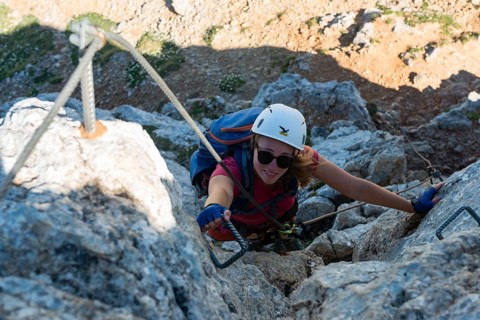 Young woman climbing