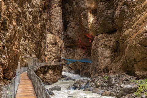 River Weisse Luetschine flows through Grindelwald glacier gorge