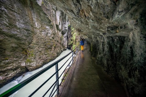 Young man in the Aareschlucht gorge in the Haslital