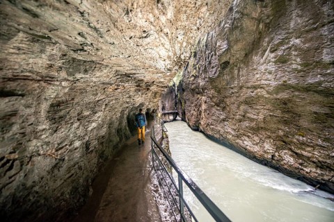 Young man in the Aareschlucht gorge in the Haslital