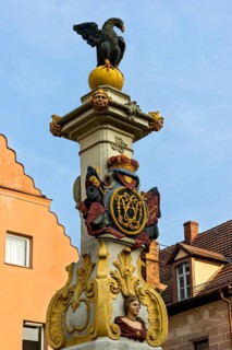 Baroque margrave fountain with Brandenburg eagle figure at the market place