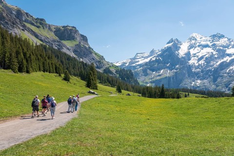 Hiker on the way to the Oeschinensee