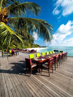 Table with place settings in tourist resort