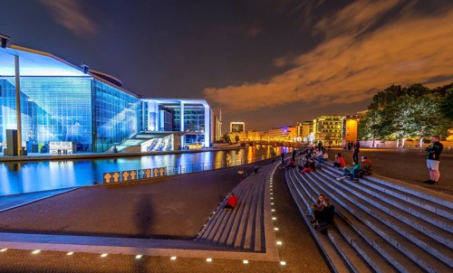 Film projection at the Marie-Elisabeth-Lueders-House on the bank of the Spree at night