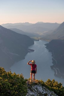Young woman looking over mountain landscape