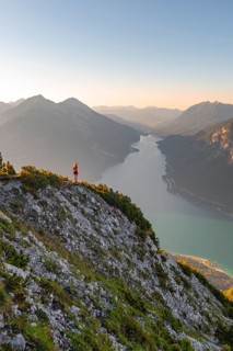 Young woman looking over mountain landscape