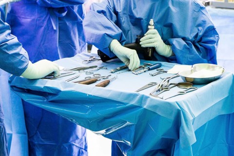 Cutlery table with surgical instruments during an operation in hospital