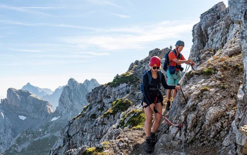 Mountaineer on a secured fixed rope route