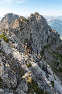 Mountaineer on a secured fixed rope route