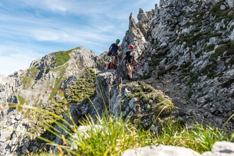Mountaineer on a secured fixed rope route