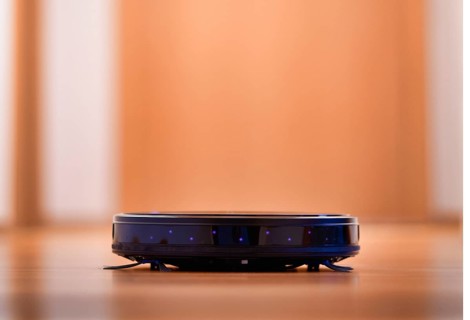 Suction robot on parquet floor