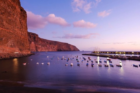 Fishing boats in the fishing port at dusk